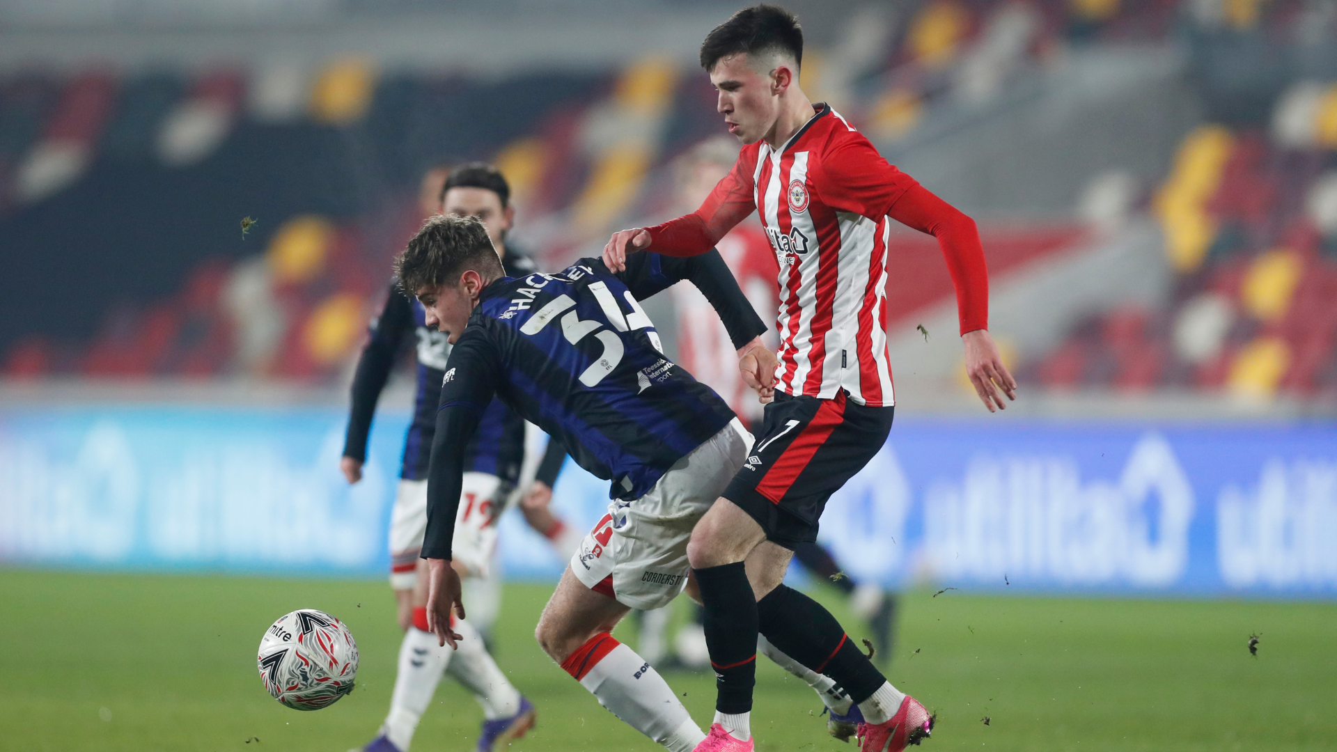 Soccer Football - FA Cup - Third Round - Brentford v Middlesbrough - Brentford Community Stadium, London, Britain - January 9, 2021 Brentford's Alex Gilbert in action with Middlesbrough's Hayden Hackney Action Images via Reuters/Matthew Childs