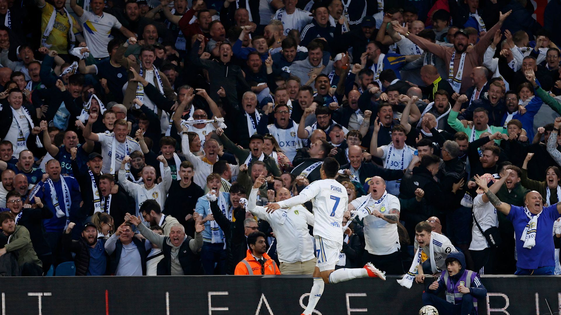 joel piroe celebrating with leeds fans