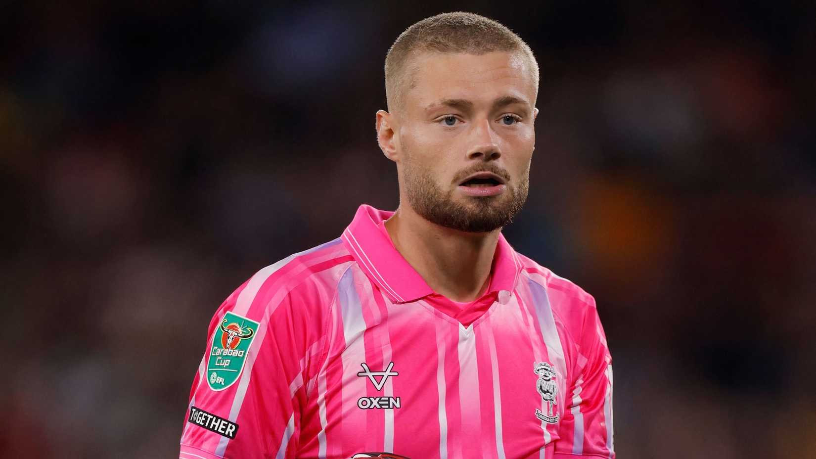 Millwall: Lincoln City goalkeeper Lukas Jensen set for medical ahead of ...