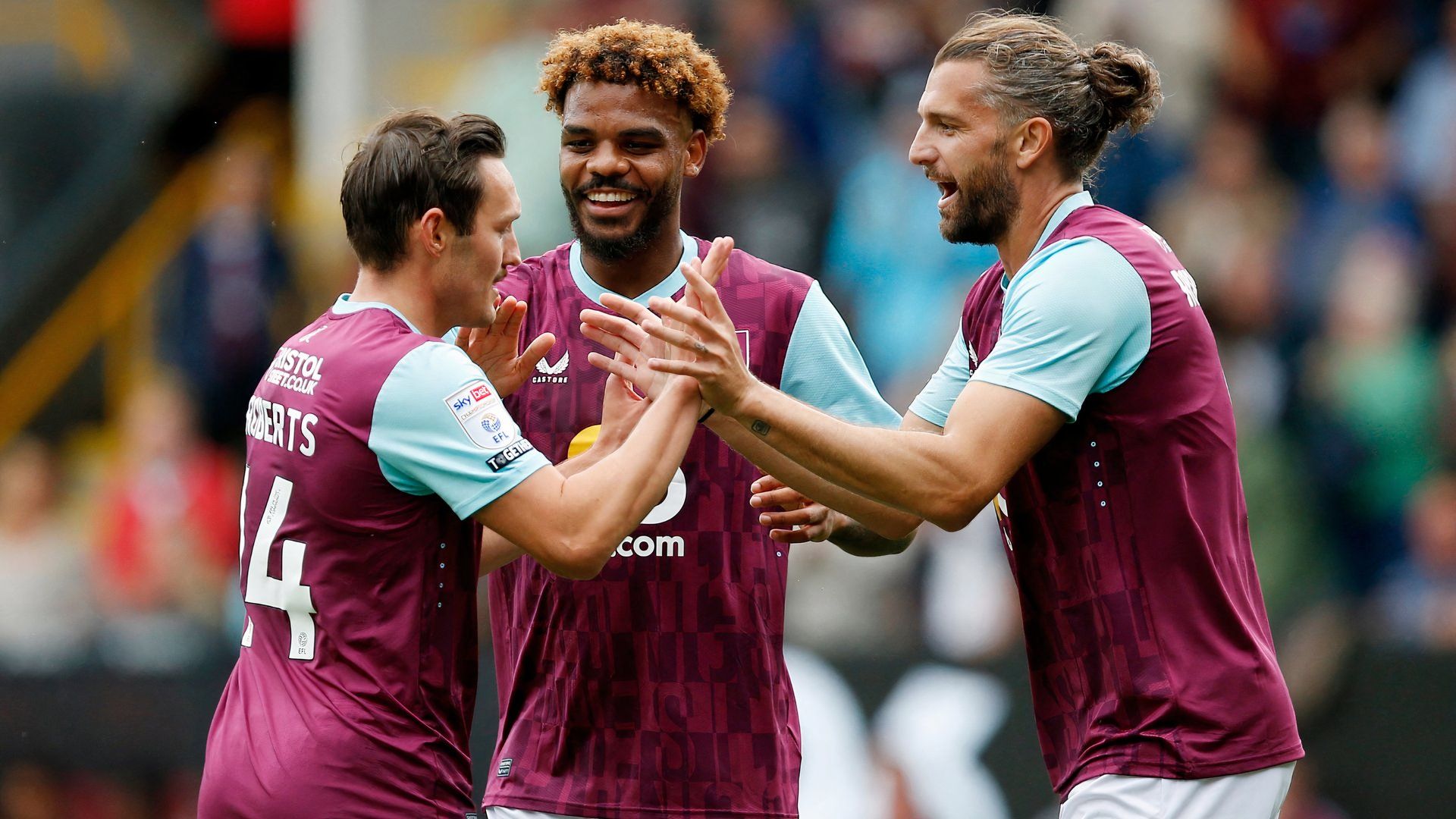 Lyle Foster of Burnley celebrates with Jay Rodriguez and Connor Roberts