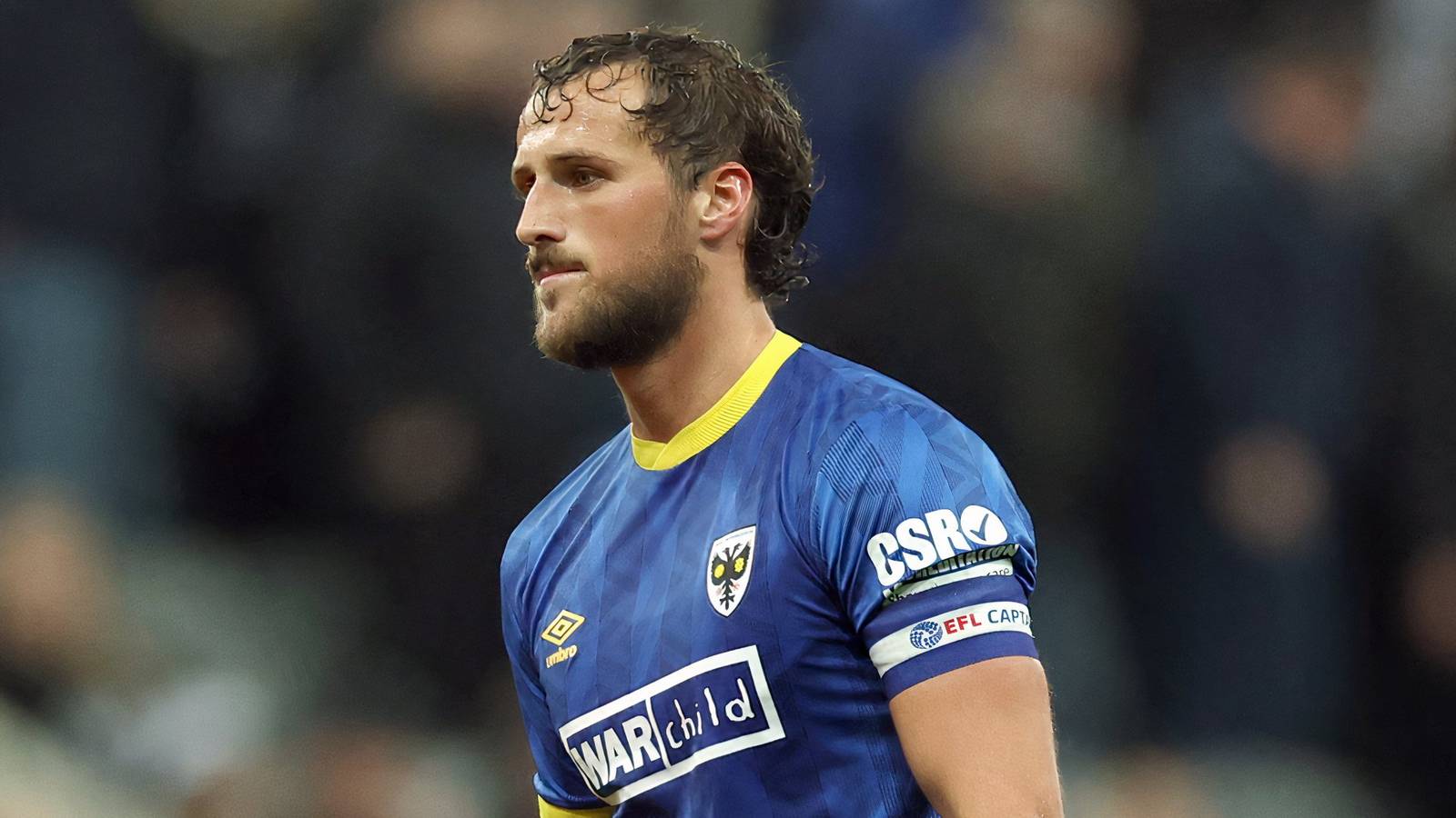 AFC Wimbledon: Joe Lewis is Johnnie Jackson's key cog in promotion-hunt