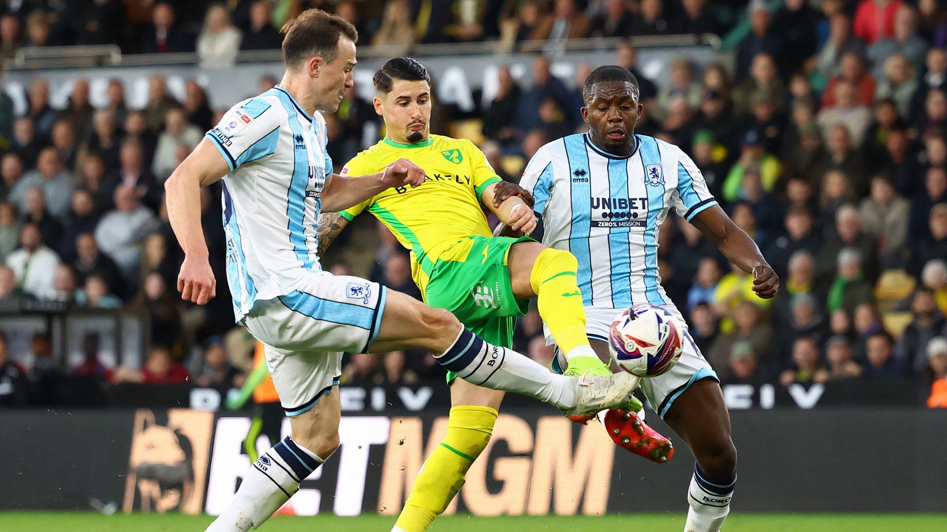 George Edmundson & Anfernee Dijksteel tackle Borja Sainz, Norwich v Middlesbrough