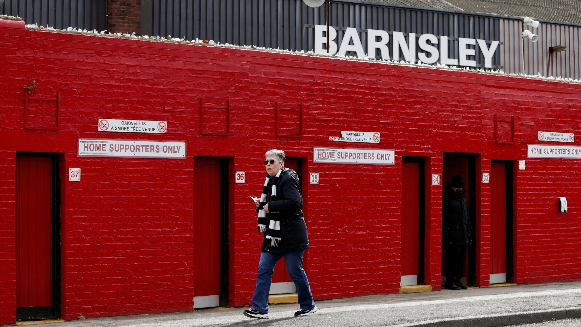 Supporter outside Barnsley's Oakwell stadium