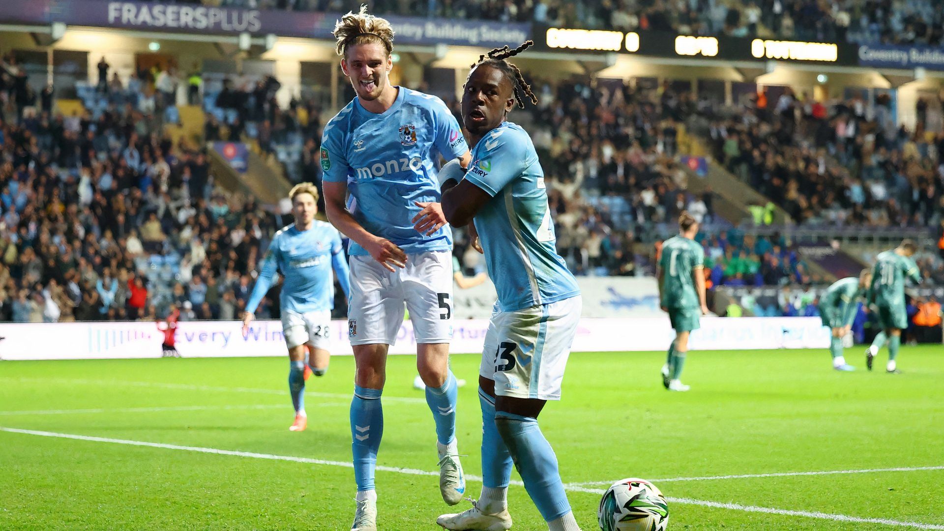 Jack Rudoni of Coventry City celebrating with Brandon Thomas-Asante