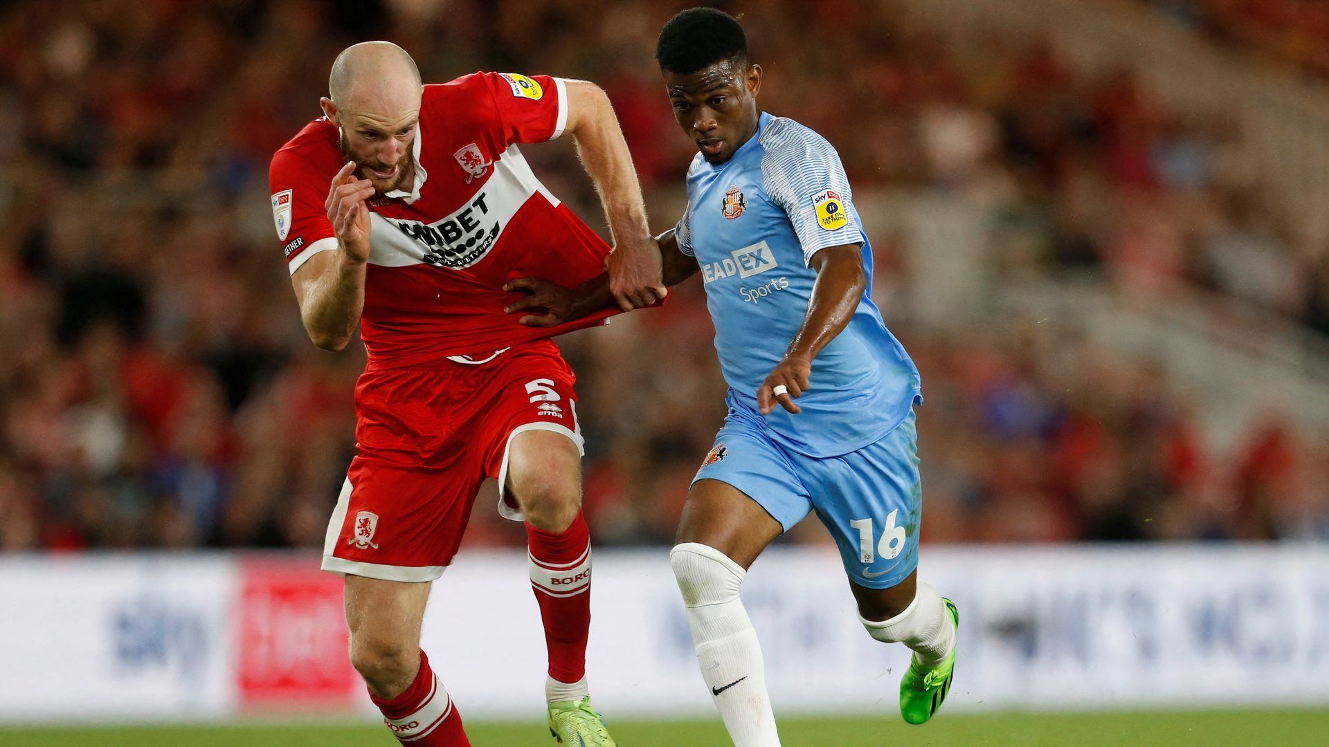 Middlesbrough's Matt Clarke battles with Sunderland's Amad Diallo