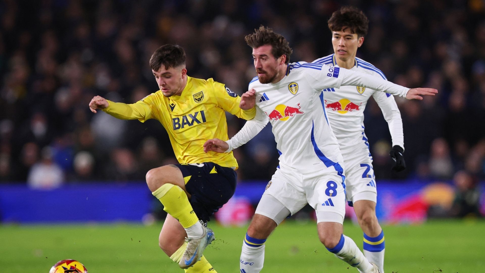 Leeds United's Joe Rothwell in action with Oxford United's Tyler Goodrham