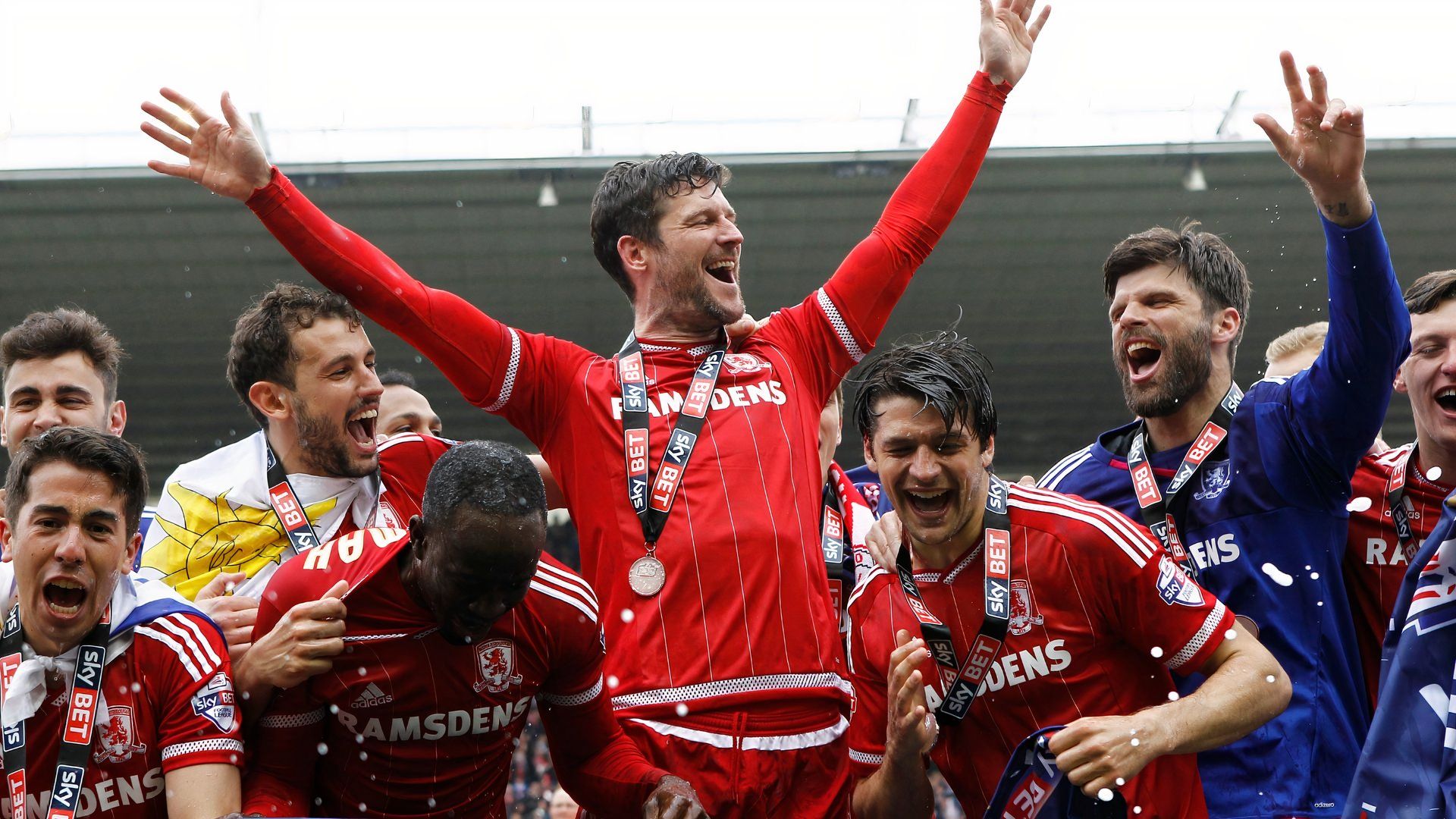 David Nugent, George Friend, Albert Adomah, Cristhian Stuan, Dimi Konstantopoulos celebrate Middlesbrough's Premier League promotion