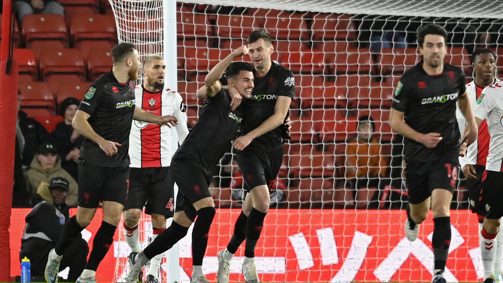 Paudie O'Connor celebrates with Lincoln City team-mates