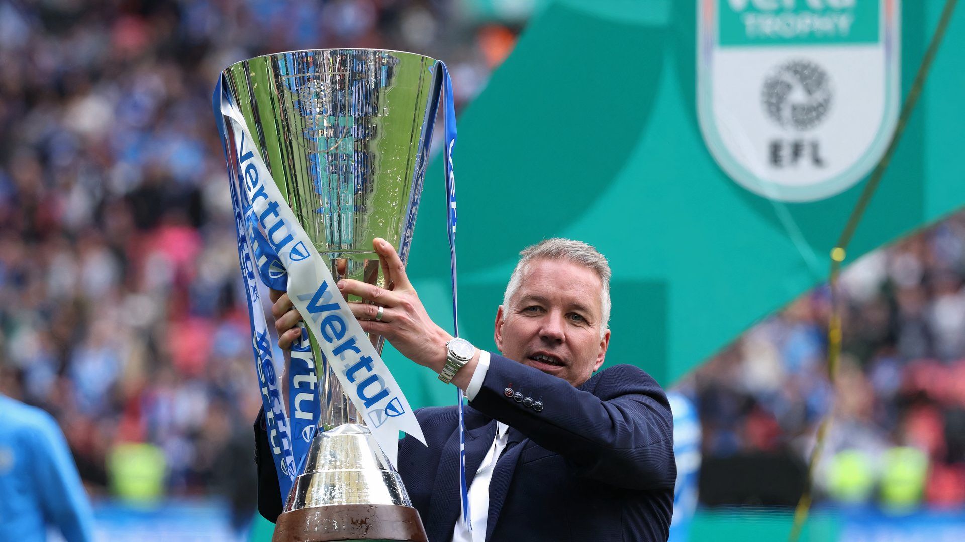 Darren Ferguson celebrates Peterborough United winning the 2025 EFL Trophy