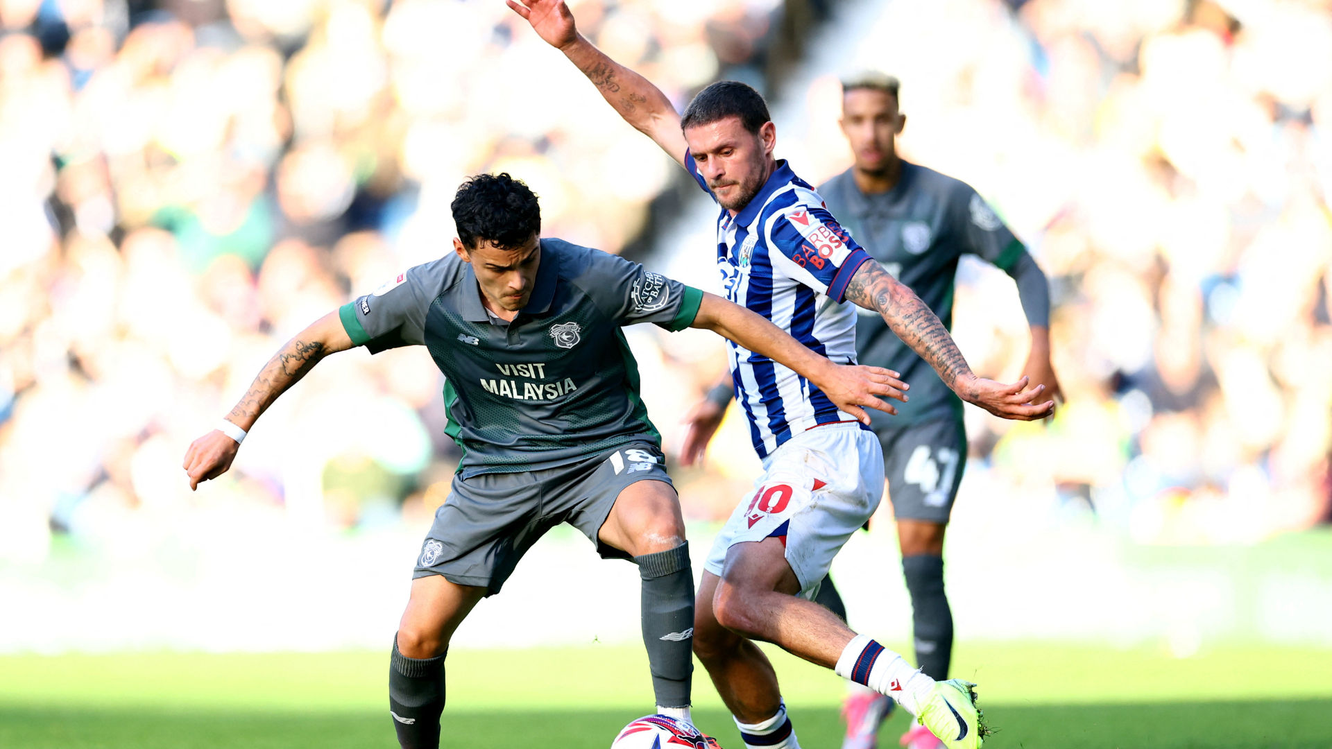 Alex Robertson in action for Cardiff against West Brom