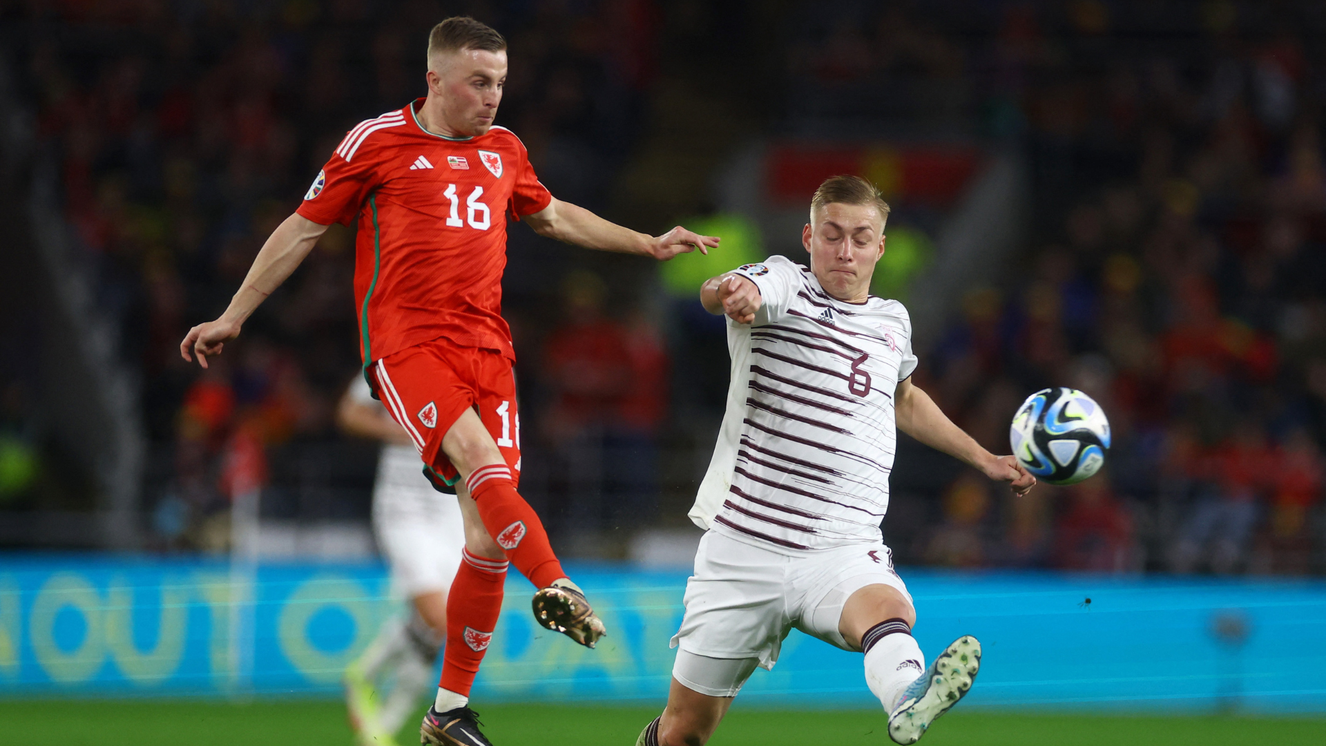 Joe Morrell in action for Wales