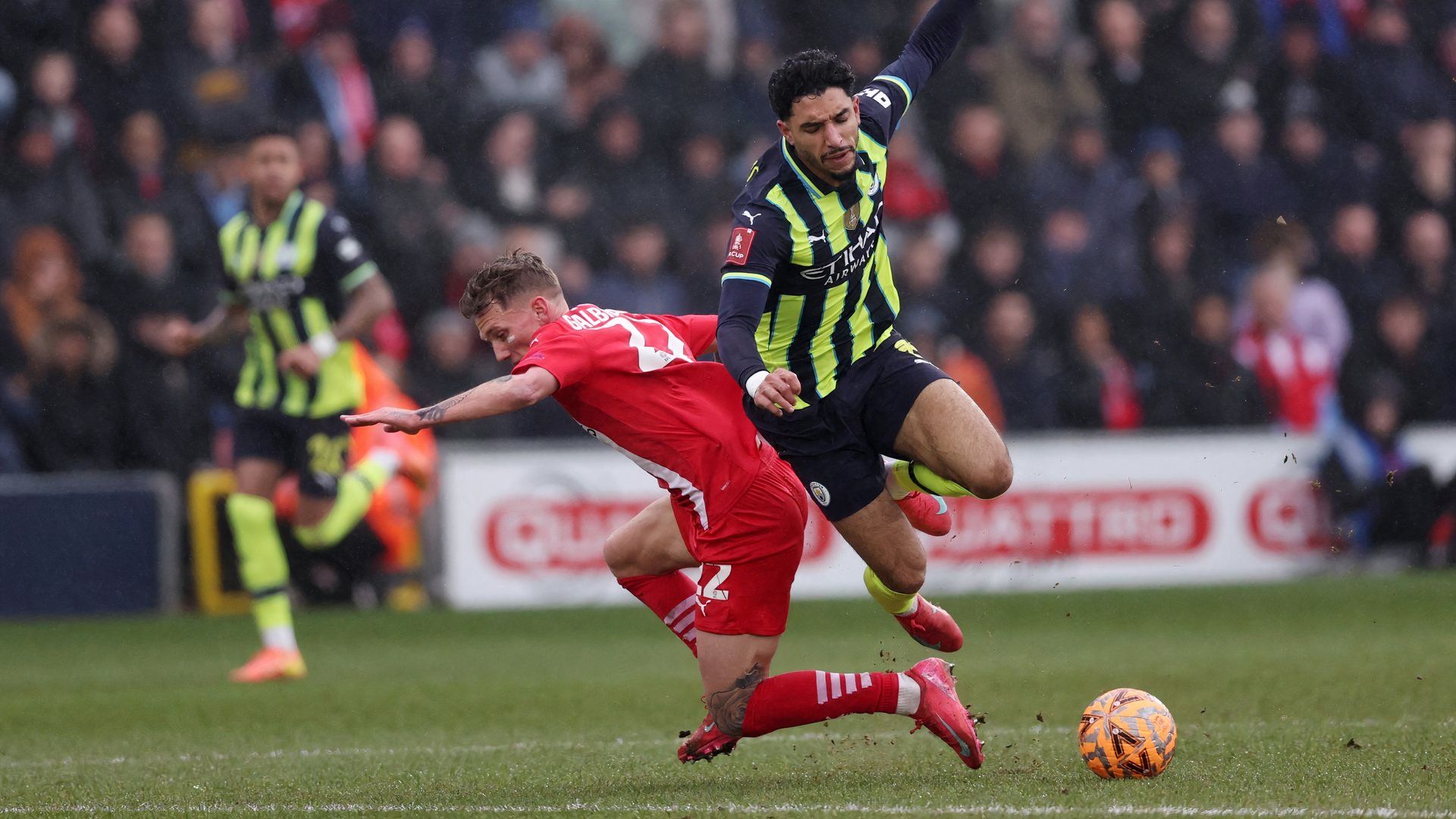 Leyton Orient's Ethan Galbraith in action with Manchester City's Omar Marmoush