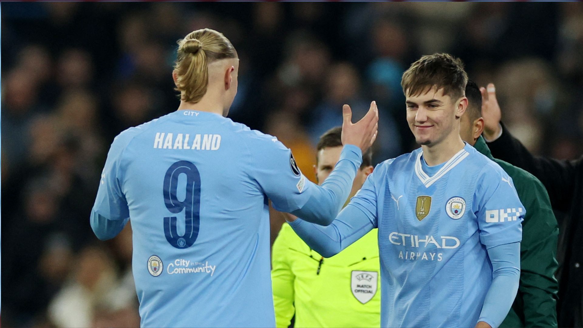 Manchester City's Erling Haaland and Jacob Wright
