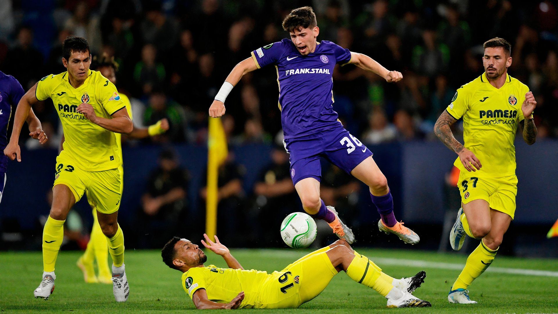 FK Austria Wien's Dominik Fitz in action with Villarreal's Francis Coquelin