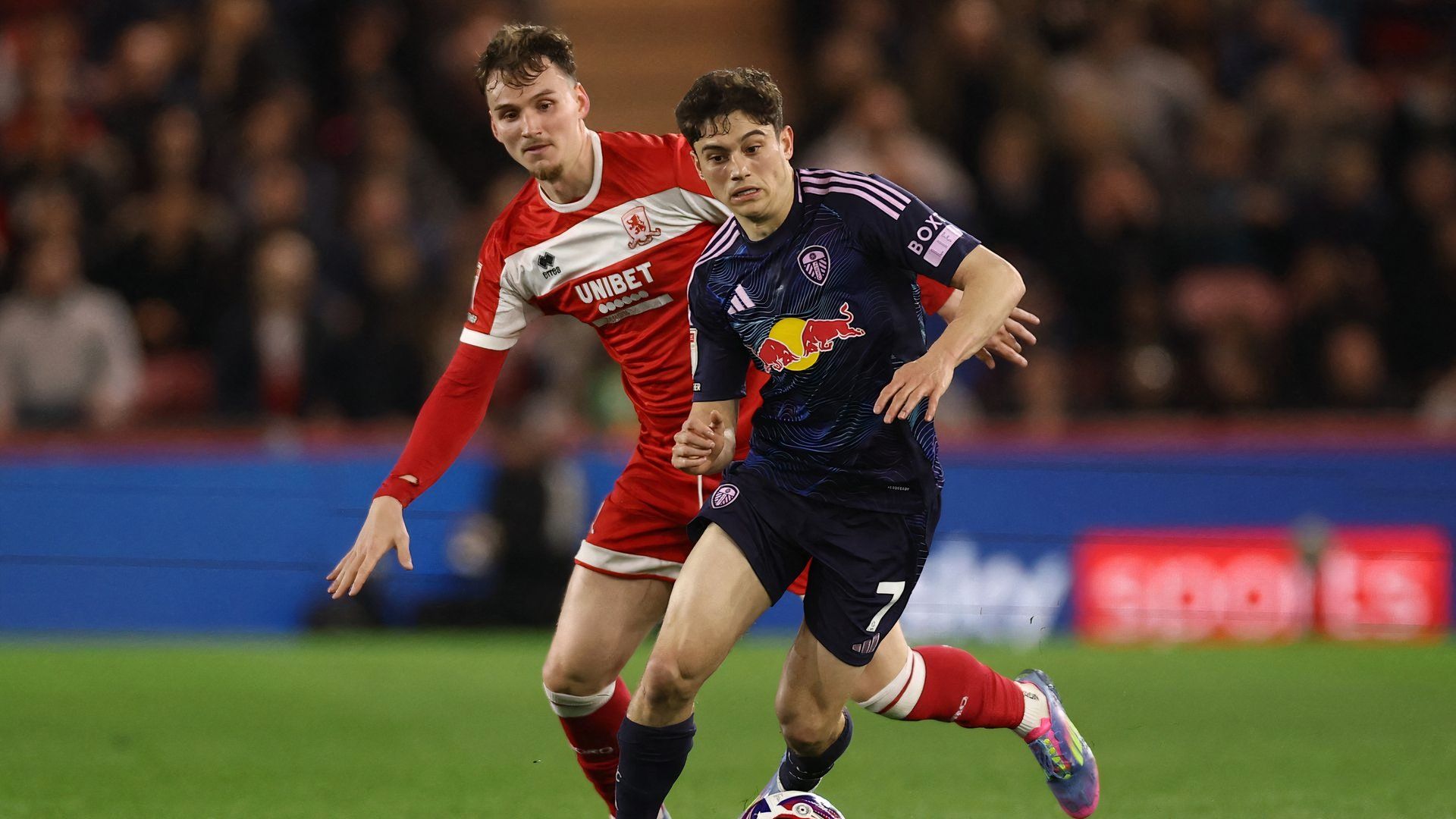Middlesbrough's Rav van den Berg in action with Leeds United's Daniel James