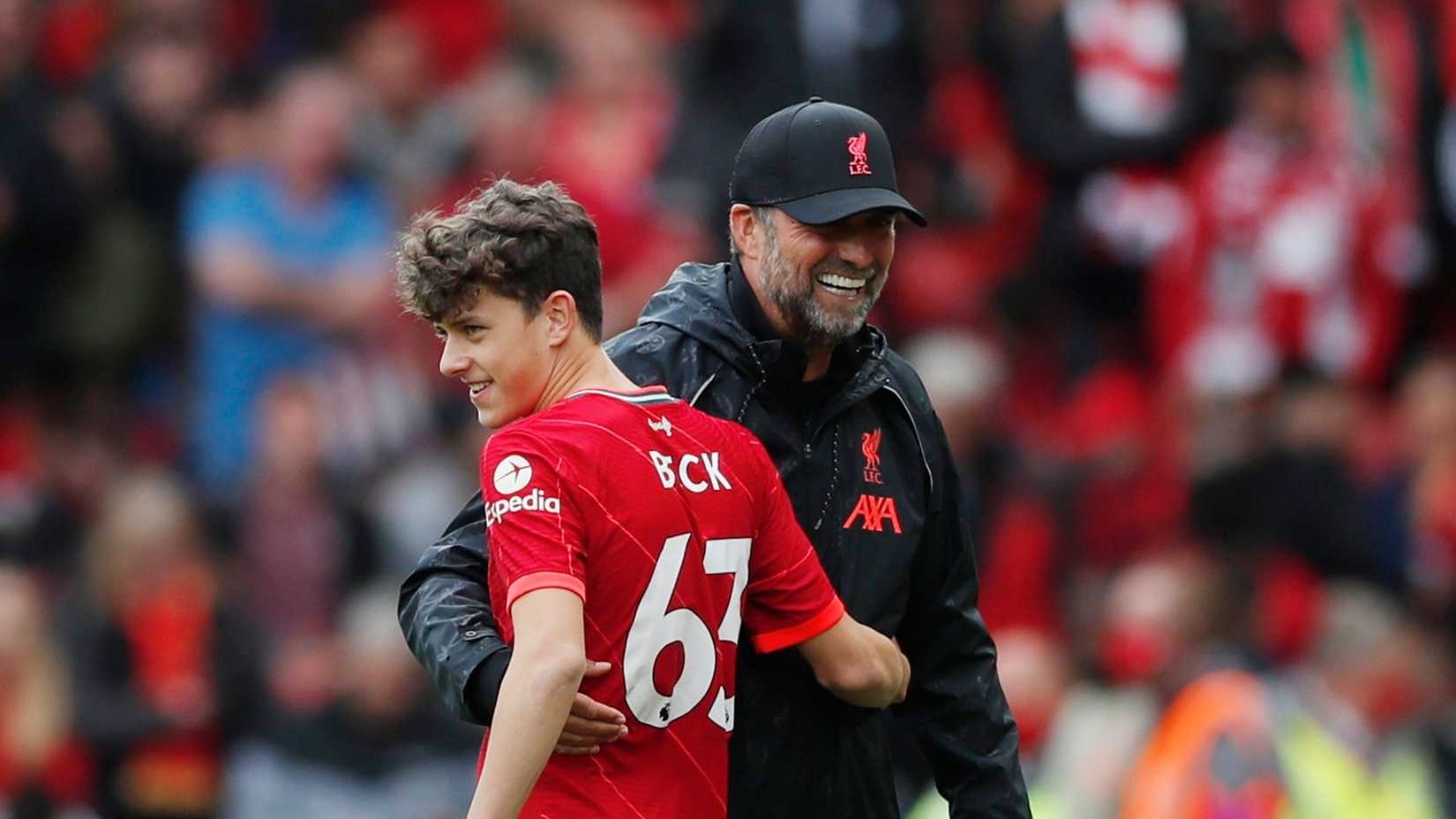 Owen Beck of Liverpool with Jurgen Klopp