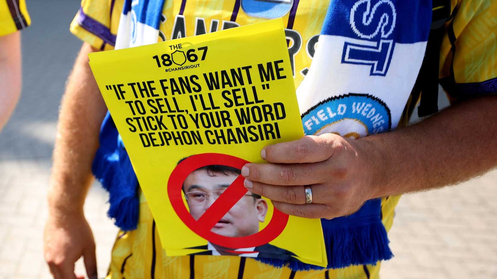 Why is Dejphon Chansiri holding up David Storch's Sheffield Wednesday ...